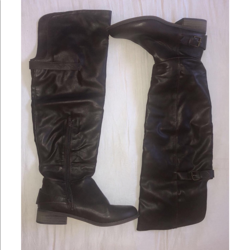 Over the knee, brown boots.